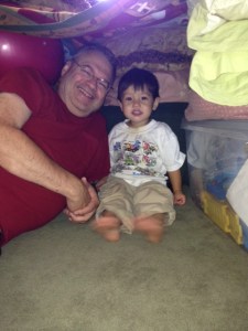Thomas and Papa smiling in Blanket fort securedownload