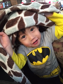 Batman Thomas Playing Under Blanket